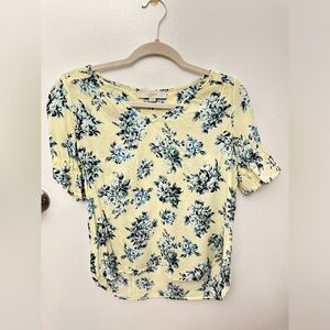 Loft floral bouse in a very pale yellow background Size S